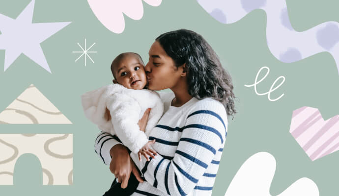 A woman hugs and kisses her baby in front of a green collage background.