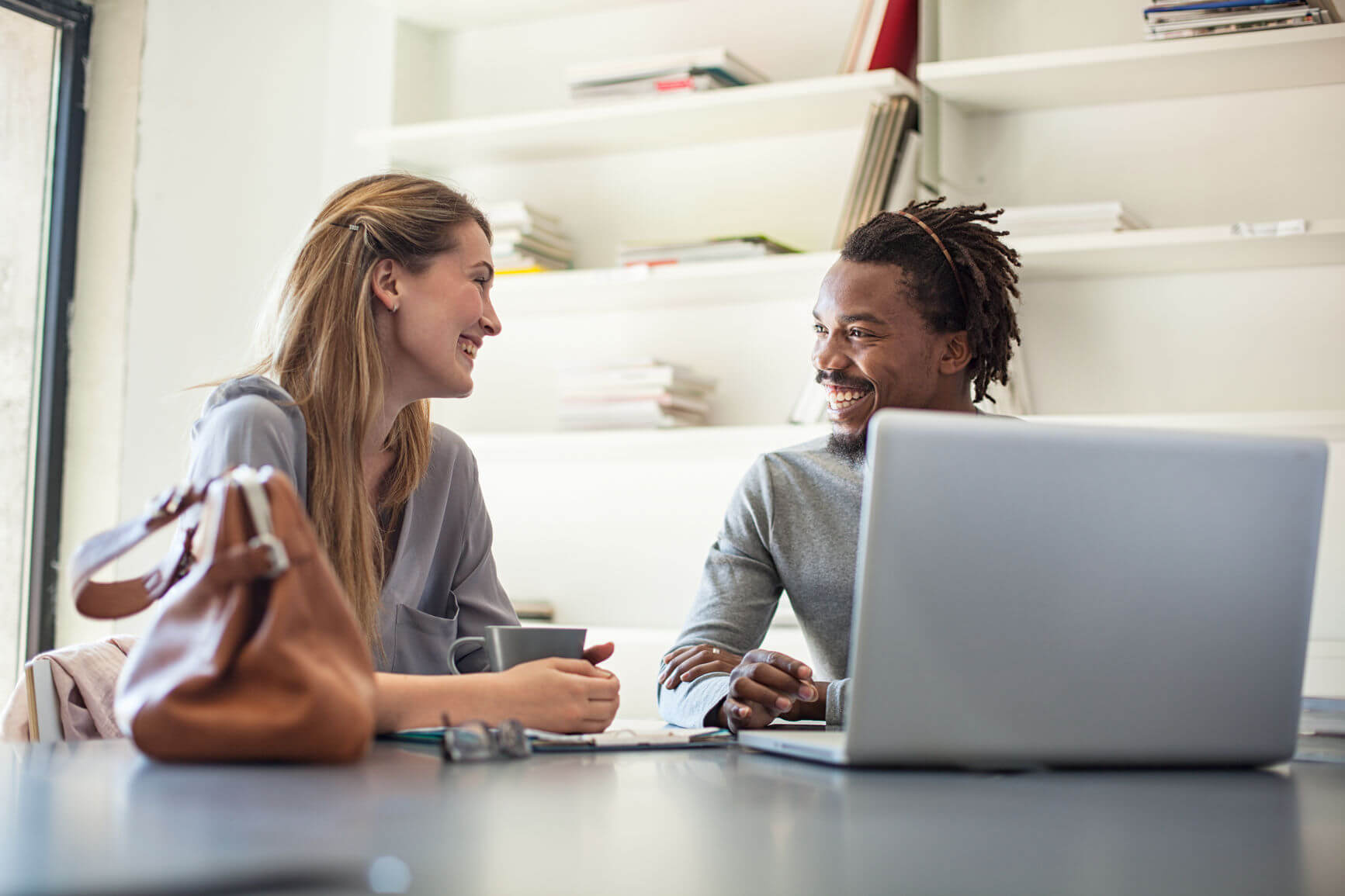 man and woman discussing questions before starting a group practice